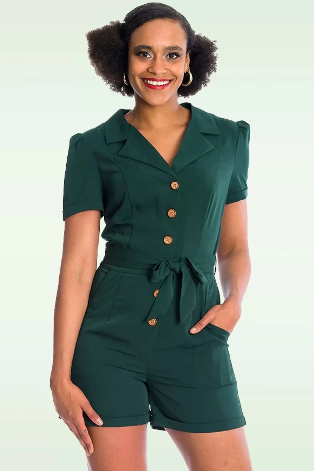 viola_playsuit_in_donker_groen_1.webp Fashion Banned Retro Viola Playsuit In Donker Groen